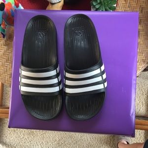Adidas slides. Black & white. Kids 4 or women’s 6.